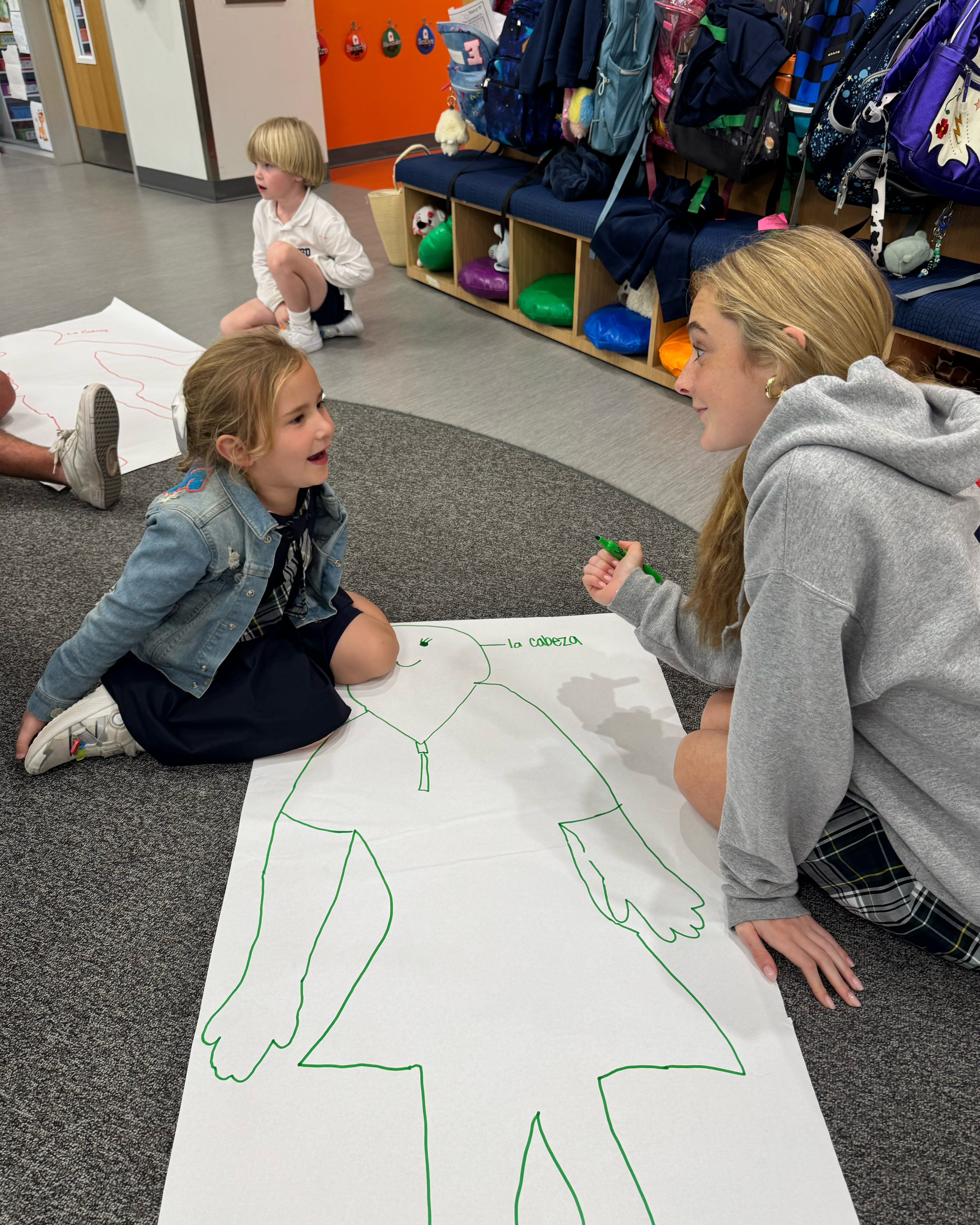 Upper School Students Practice Spanish with Kinder Friends